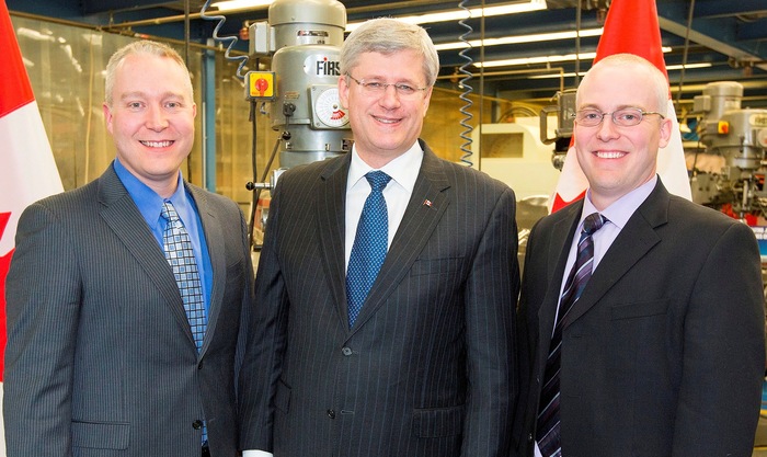 Owners of CPG Aerospace with PM Stephen Harper